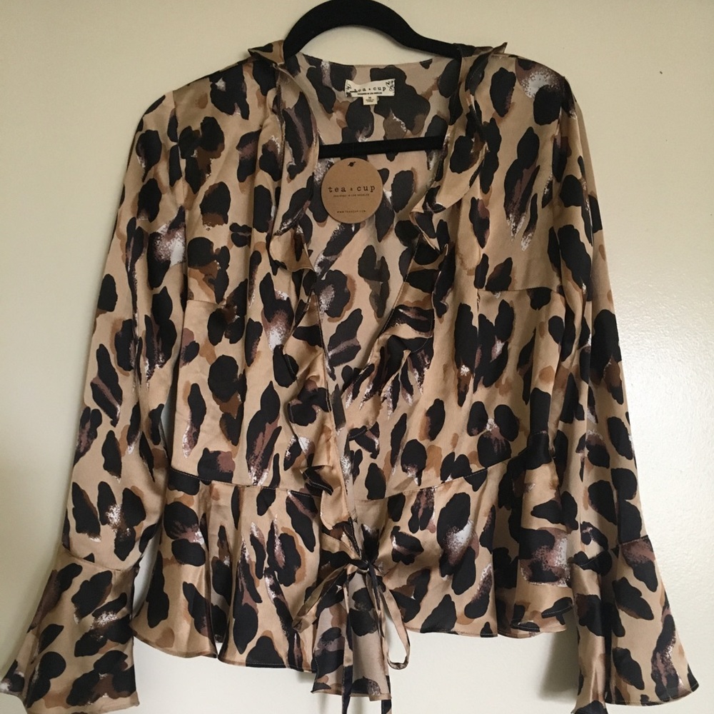 Vici leopard tie blouse